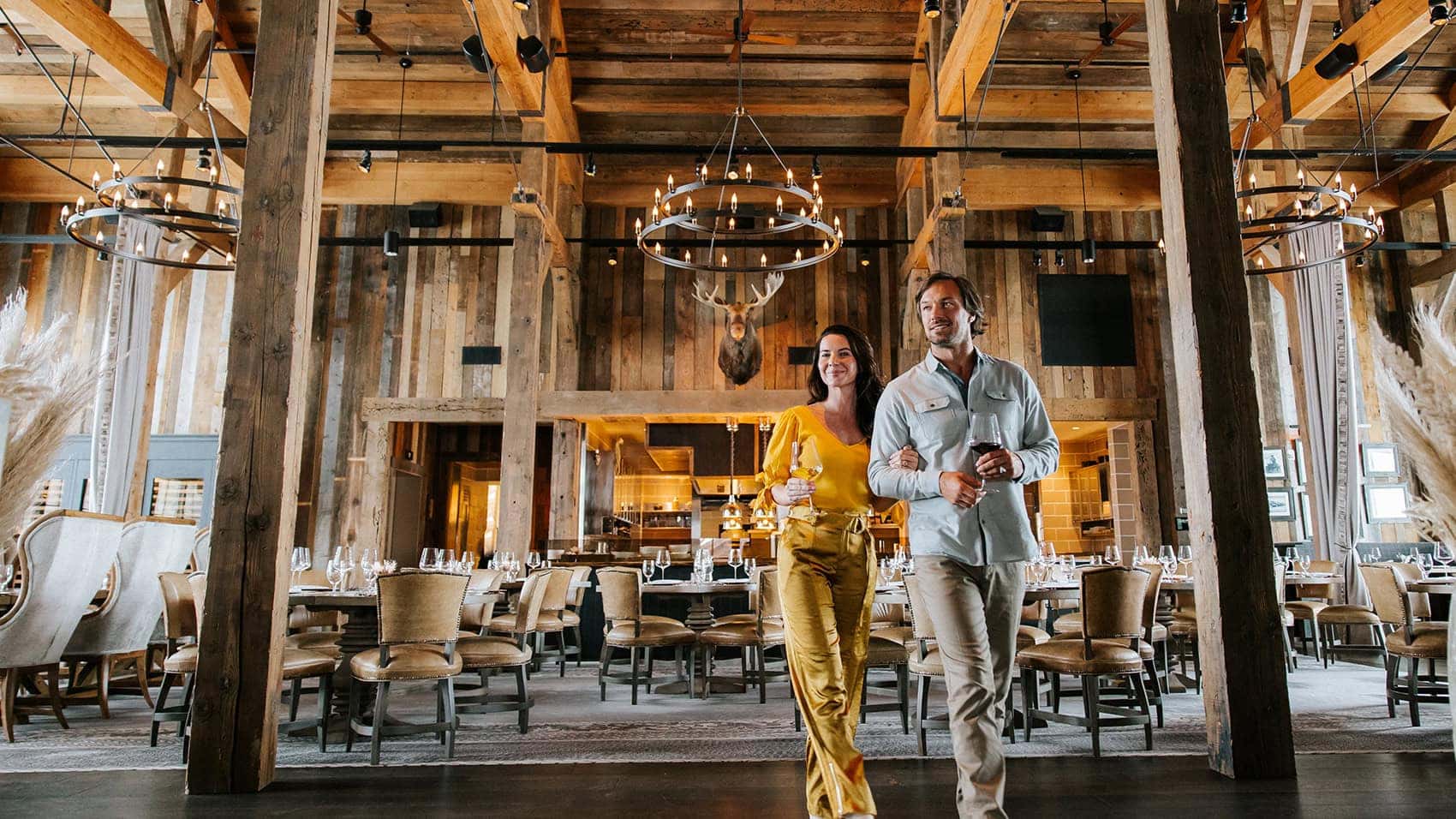 A couple walking through Trailhead Lodge